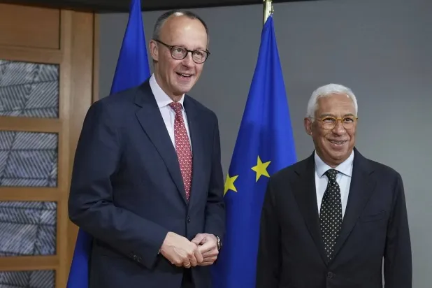 European Council President Antonio Costa, right, greets Friedrich Merz, leader of the Christian Democratic Union, prior to a meeting at the European Council building in Brussels, Thursday, March 6, 2025. (AP)