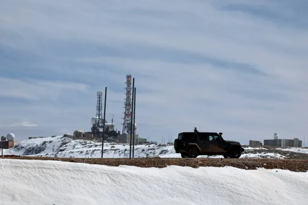 آلية إسرائيلية خلال دورية في الجولان (إ.ب.أ)