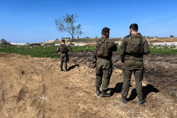 Israeli soldiers patrol near the Israel-Lebanon border, in Israel, March 12, 2025. REUTERS/Avi Ohayon