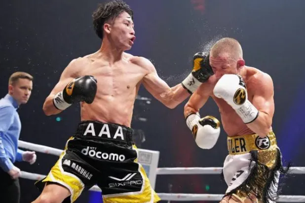 الملاكم ناويا إينوي (رويترز)