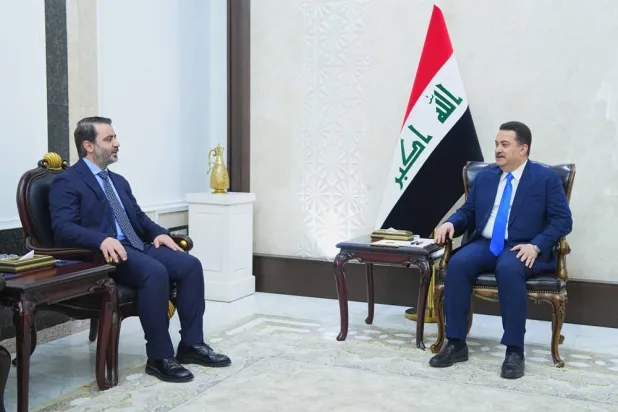 Iraqi Prime Minister Mohammed Shia al-Sudani meets with Syrian Foreign Minister Asaad al-Shaibani, in Baghdad, Iraq, March 14, 2025. (Iraqi Prime Minister Media Office/Handout via Reuters) 