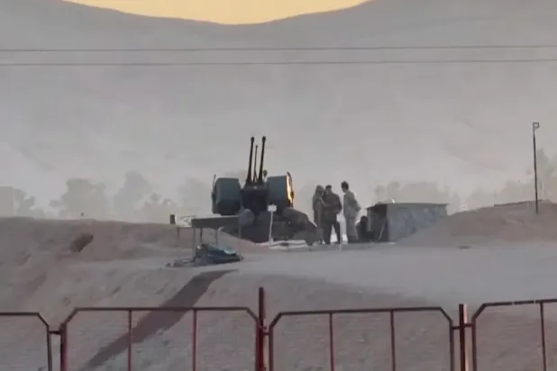 Military personnel stand guard at a nuclear facility in the Zardanjan area of Isfahan, Iran, April 19, 2024, in this screengrab taken from video. WANA (West Asia News Agency) via REUTERS/File Photo 