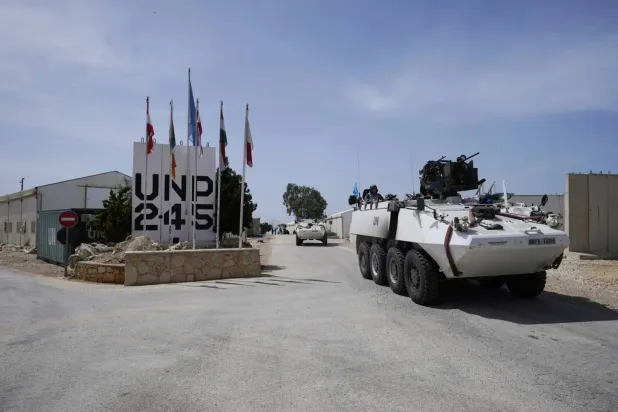 UNIFIL vehicles conduct a military patrol in a border area between Lebanon and Israel (DPA). 