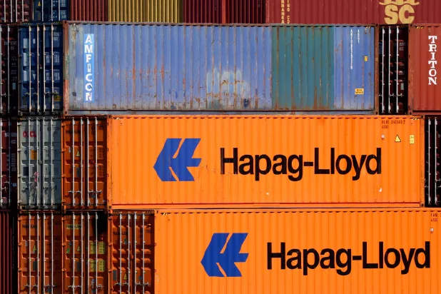 حاويات مكدسة في محطة شحن (إ.ب.أ)