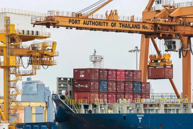 Container cargo ships docked at Bangkok port (Reuters) 