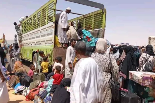 سودانيون عائدون إلى بلادهم (وكالة الأنباء السودانية)
