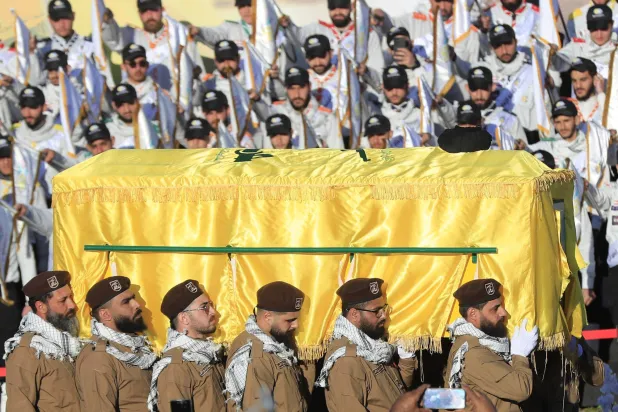 Hezbollah fighters carry the coffin of former Secretary-General Hashem Safieddine during his funeral on February 24, 2025. (AP) 