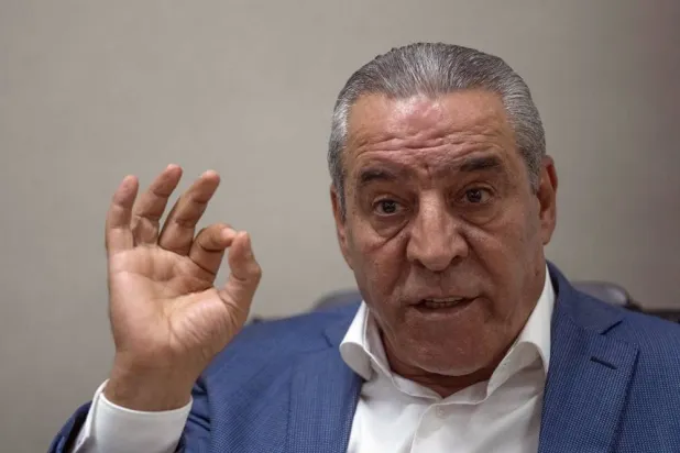 عضو اللجنة التنفيذية في منظمة التحرير الفلسطينية حسين الشيخ (أ.ب)