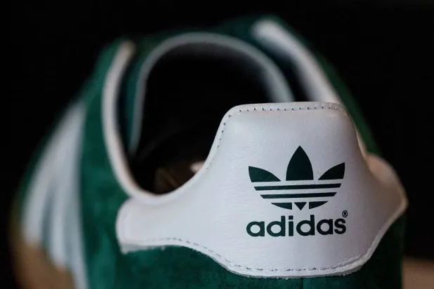 The logo of Adidas is seen on a Gazelle sneaker for sale at a shop in Berlin, Germany, May 2, 2024. (Reuters)