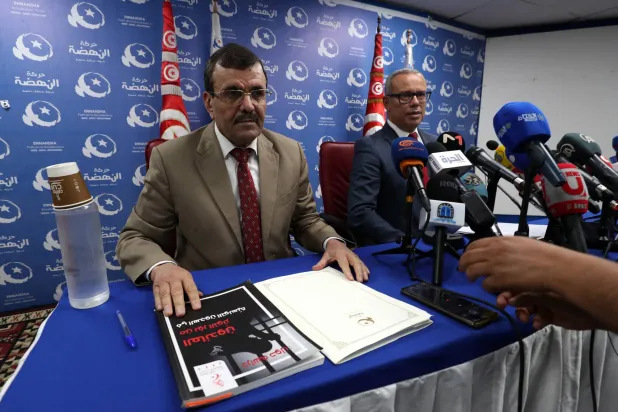 وزير الداخلية الأسبق علي العريض (إ.ب.أ)