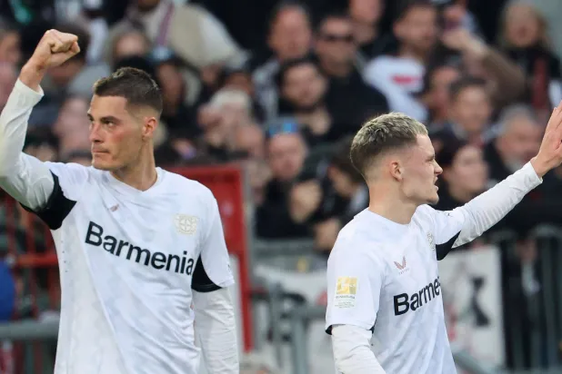 نادي بايرن ميونيخ يهدف للتعاقد مع لاعب ثالث من باير ليفركوزن (أ.ف.ب)