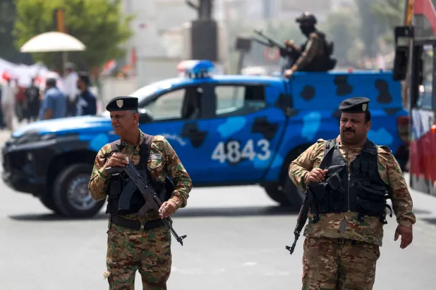 مئات الضباط والجنود العراقيين ضمن خطة لتأمين وفود القمة العربية في 17 مايو 2025 (أ.ف.ب)