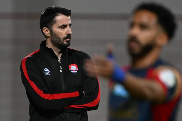 ريزيتش مدرب الرائد (تصوير: علي خمج)