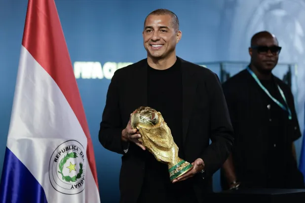 ديفيد تريزيغيه (إ.ب.أ)