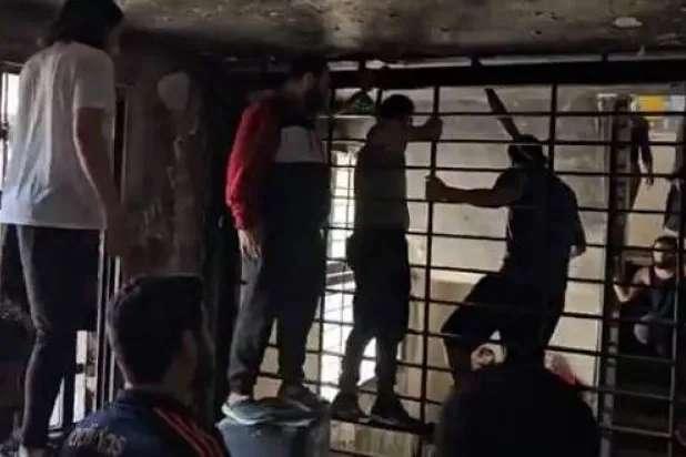 A video grab of prisoners carrying out mock hangings at Roumieh prison, east of Beirut. Asharq Al-Awsat
