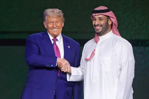 Prince Mohammed bin Salman, Saudi Crown Prince and Prime Minister, and US President Donald Trump attend the Keynote Address at the Saudi-US Investment Forum in Riyadh, Saudi Arabia, 13 May 2025. (EPA)  
