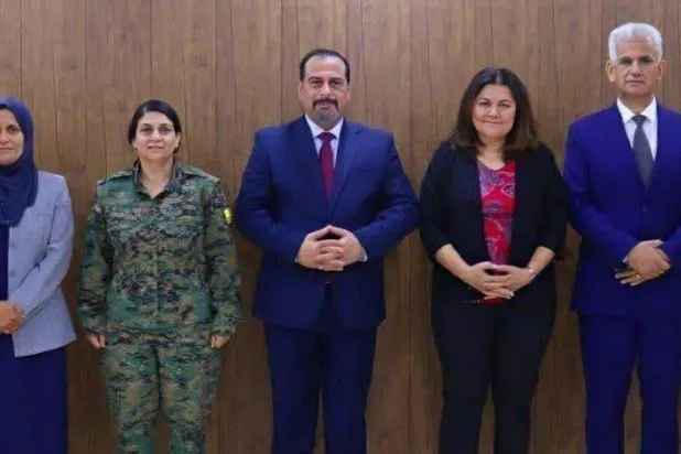 أعضاء وفد الإدارة الذاتية المفاوض مع الحكومة السورية (الشرق الأوسط)
