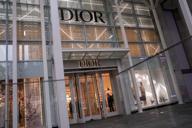 A security guard looks out from the store of French luxury goods company Dior on 5th Avenue in New York City, US, May 23, 2025. (Reuters)