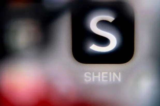 (FILES) A photo taken on April 16, 2025 shows the Chinese e-commerce company Shein app logo on a smartphone screen in Frankfurt am Main, western Germany. (Photo by Kirill KUDRYAVTSEV / AFP)