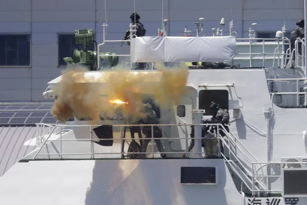 أفراد من خفر السواحل التايواني يشاركون في التدريبات (أ.ب)