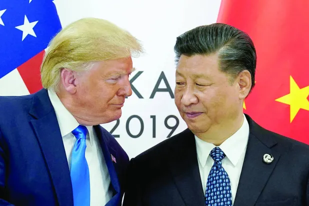 
الرئيسان الصيني شي جينبينغ والأميركي دونالد ترمب خلال مشاركتهما في قمة مجموعة العشرين في أوساكا عام 2019 (رويترز)