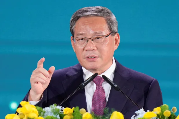 رئيس مجلس الدولة الصيني لي تشيانغ يتحدث في العشاء الرسمي للمنتدى الاقتصادي لرابطة دول جنوب شرقي آسيا (أرشيفية - رويترز)