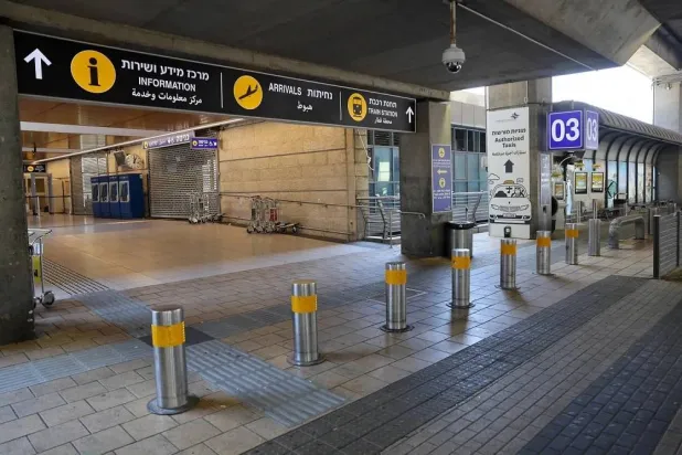 This picture shows the empty arrivals hall at Ben Gurion Airport near Tel Aviv on June 13, 2025, after Israel closed its airspace to takeoff and landing. (AFP) 