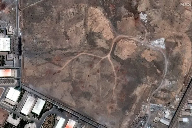 A satellite image shows new vehicle tracks and dirt piles over underground centrifuge facility at the Natanz nuclear facility in Iran after airstrike in Iran in this handout image dated June 15, 2025. (Maxar Technologies/Handout via Reuters) 