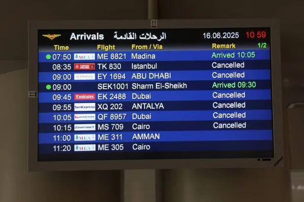 Flight information display screen shows updates about cancelled flights, due to schedule disruptions stemming from the Iran-Israel conflict, at the Beirut-Rafik Hariri International Airport, Lebanon June 16, 2025. (Reuters)