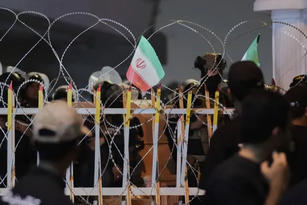 Iraqi security forces close a bridge leading to the Green Zone where the US Embassy is located, during a protest against Israeli attacks on multiple cities across Iran, in Baghdad, Iraq, Monday, June 16, 2025. (AP)
