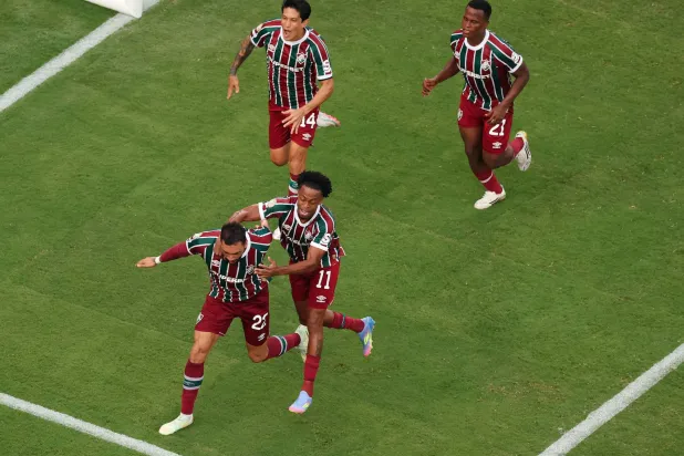 اقتنص فلومينينسي فوزاً ثميناً قربه من التأهل لدور الـ16 (أ.ف.ب) 