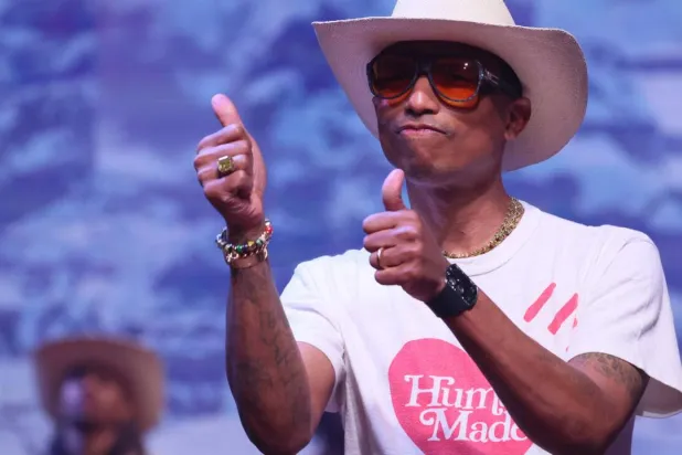 Pharrell Williams at a Louis Vuitton Paris show last year. ALAIN JOCARD / AFP/File
