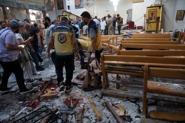 Emergency services work at the scene of a suicide bombing at Mar Elias Church on the outskirts of Damascus, Syria, 22 June 2025. EPA/MOHAMMED AL RIFAI