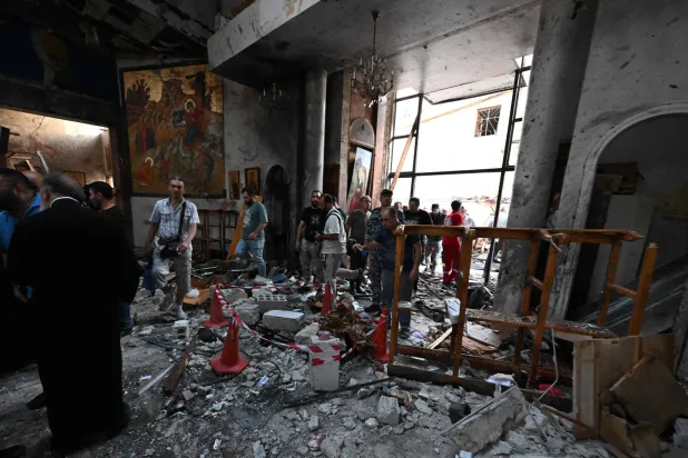 جانب من الدمار في «كنيسة مار إلياس» في دمشق بعد هجوم «داعش» الإرهابي (أ.ف.ب)