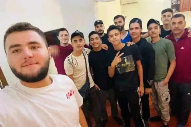A photo shows young Syrian men who drowned after their boat capsized off the coast of Libya. Credit: Rights activist Tarek Lamloum