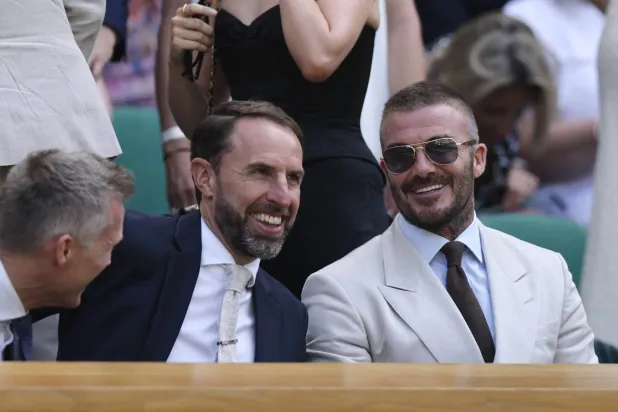 غاريث ساوثغيت وبيكهام (رويترز)