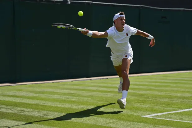 الدنماركي هولغر رونه ودّع «ويمبلدون» مبكراً (أ.ف.ب)