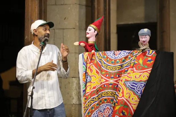 عرض تراثي لفن الأراجوز خلال المهرجان (إدارة المهرجان)