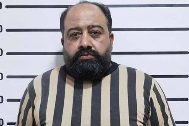 عبد الرحمن دحروج متورط بنبش القبور شمال سوريا خلال عمله مع ميليشيات  نظام الأسد (سانا)