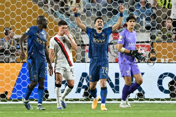 علي لاجامي يحلم بتكرار الإبداع الهلالي في ربع النهائي (أ.ف.ب)