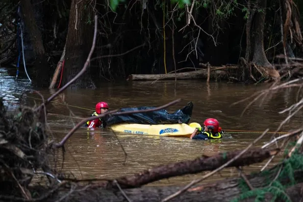  Firefighters from Ciudad Acuña, Mexico, transport a recovered body on the flooded Guadalupe River days after a flash flood swept through the area, Monday, July 7, 2025, in Ingram, Texas. (AP) 