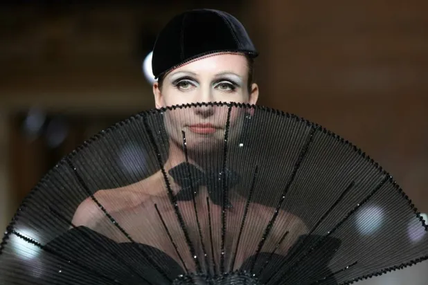 A model wears a hat during a presentation of creations for Giorgio Armani Privé during the Women's Haute-Couture Fall/Winter 2025-26 collection show at Palazzo Armani in Paris, on July 8, 2025. (AFP)