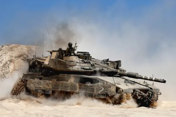 Gazze Şeridi sınırındaki bir İsrail tankı (AFP)