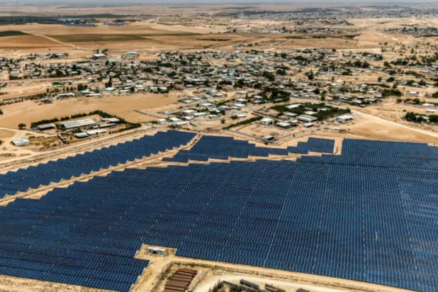 This aerial view shows solar panels at an electricity-generation plant for the Bedouin community in the village of Tirabin al-Sana in Israel's southern Negev desert Photo: Menahem KAHANA
