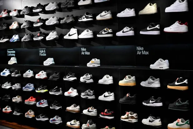 Shoes are displayed inside a Nike store at a shopping mall in Hanoi July 3, 2025. (AFP)