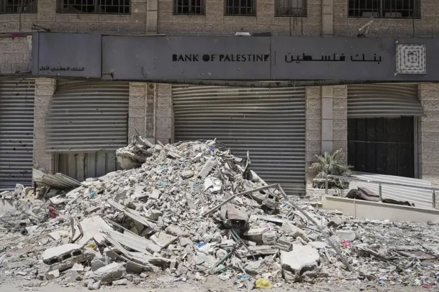 A destroyed branch of the Bank of Palestine in the Tal al-Hawa neighborhood of Gaza City is seen Wednesday, July 9, 2025. (AP) 