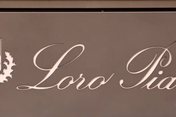 FILE PHOTO: The logo of Loro Piana is seen in a shop in downtown Rome, Italy February 10, 2016. REUTERS/Tony Gentile/File Photo