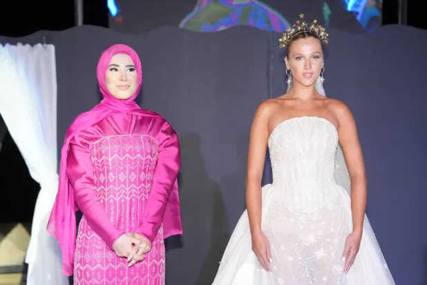 ريم صالح وفستان زفاف من تصميمها (المُلحَقة الإعلامية)