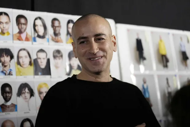 FILE - Fashion designer Francesco Risso in the backstage prior to a Marni Fall/Winter 2025-2026 Womenswear fashion show, during the Fashion Week, in Milan, Italy, Wednesday, Feb. 26, 2025. (AP Photo/Luca Bruno, File)