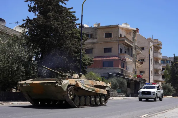 مركبة عسكرية تعبر في السويداء، سوريا 16 يوليو 2025 (رويترز)